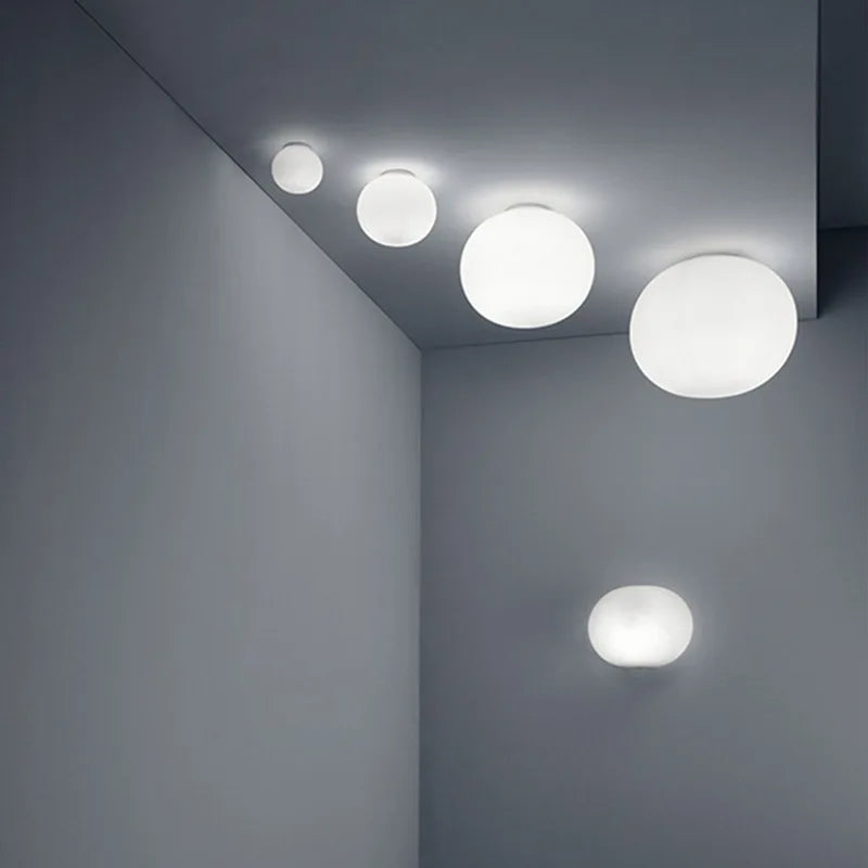 GlaciaGlow - Minimalistisk Glas Stenvæglampe