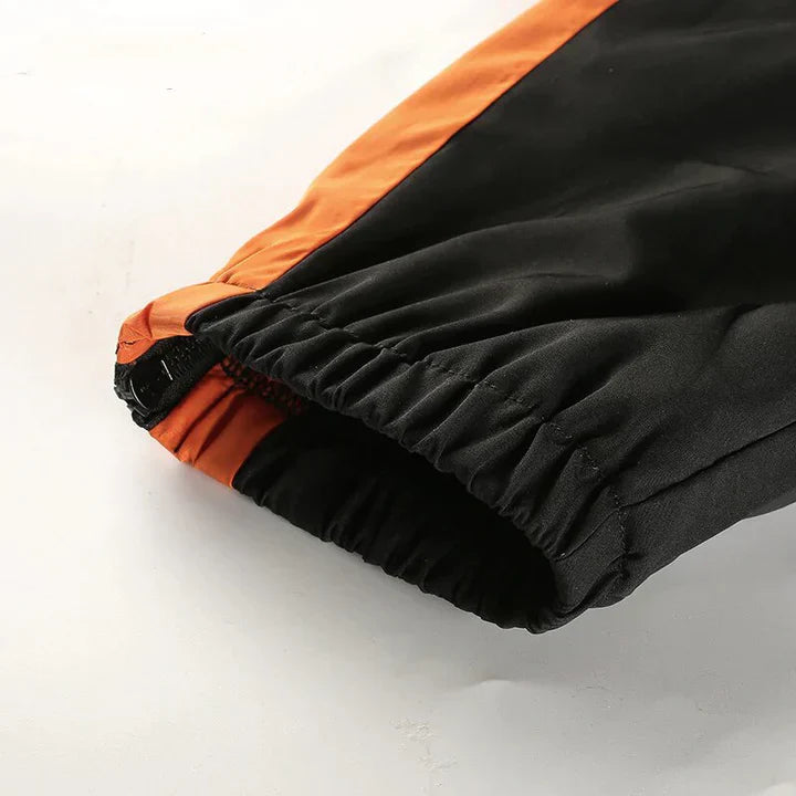Orange og blå bukser til kvinder med tidløs appel