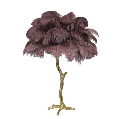 PlumeAura - Bordlampe med gyldne strudsefjer