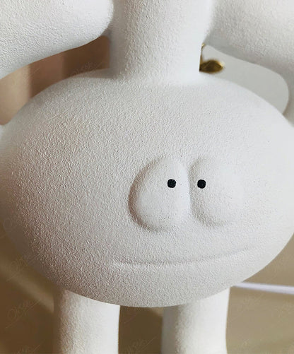 BotLuxe - Bordlampe med kreativt robotdesign og behageligt skær